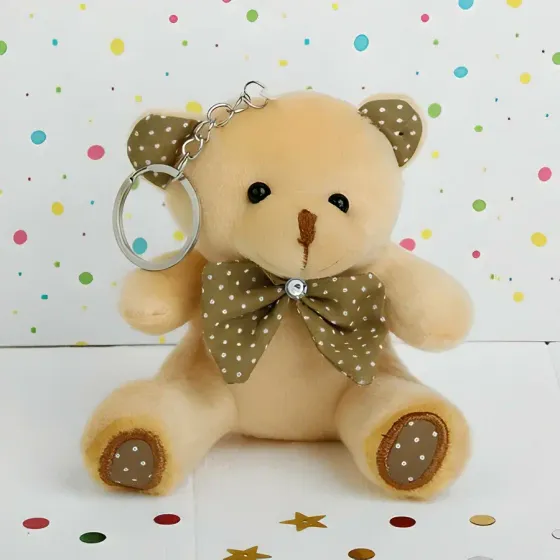!09 Плюшевый игрушка-брелок «Мишка», бант в горошек, 10 см. цвет светлый беж