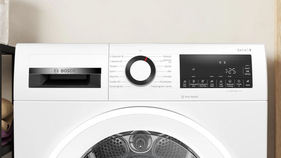 Сушильная машина Bosch WQG242AASN белый 9кг