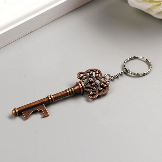!09 Брелок металл "Ключ сплетённые сердца" бронза 7,5х2,6 см