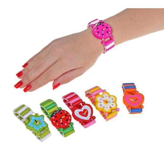 !09 Набор школьных принадлежностей (15 предметов): линейка - 2 шт.,  треугольник- 2 шт., транспортир, дырокол, ластик  - 3 шт., часы, держатель - 4 шт., точилка